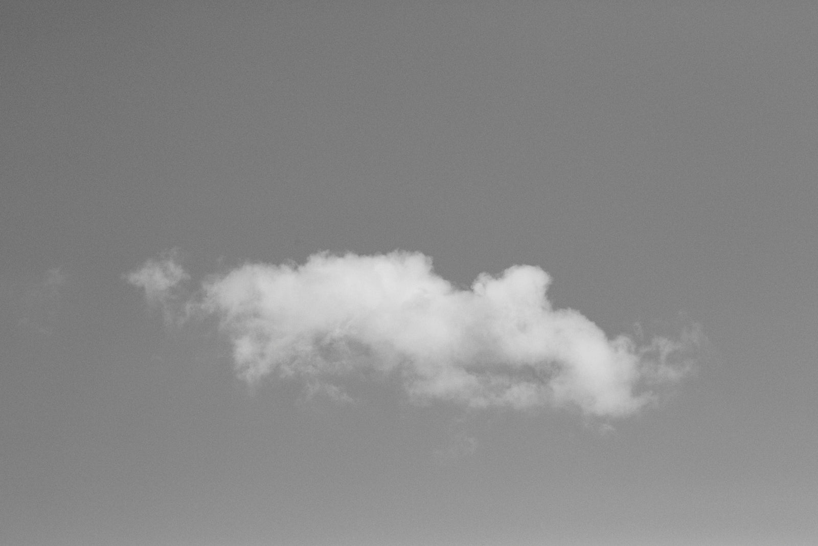 A single cloud in an open sky